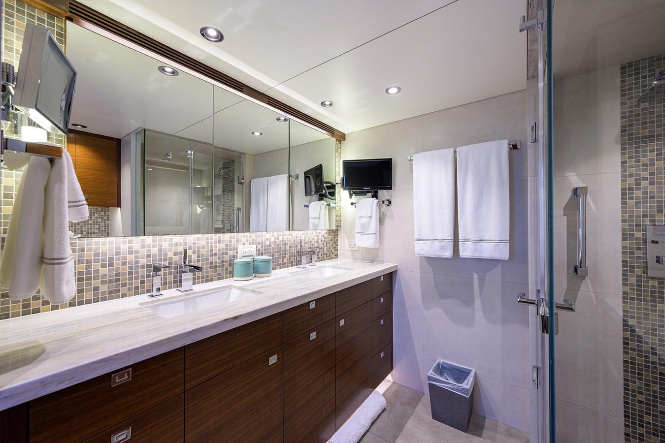 a bathroom with a large mirror aboard LACEY KAY Yacht for Sale