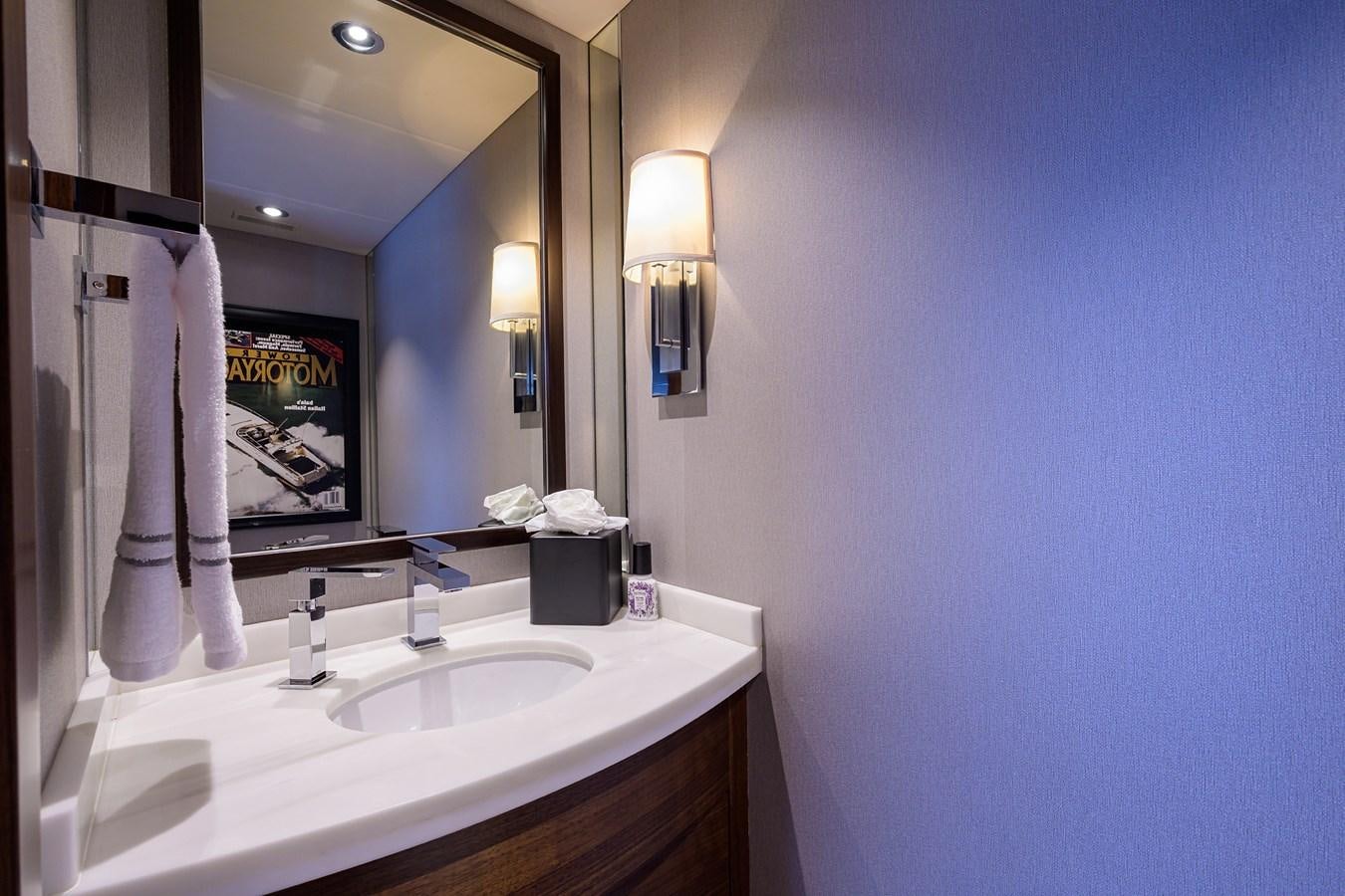 a bathroom with a large mirror aboard LACEY KAY Yacht for Sale