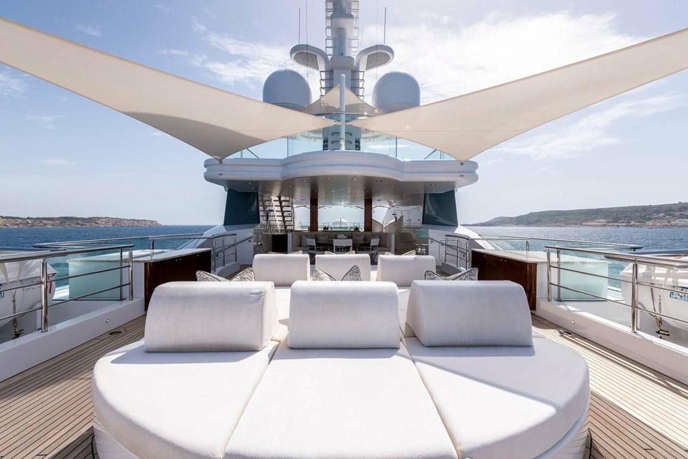 a large white lounge chair on a boat on the water aboard TALISMAN C Yacht for Sale
