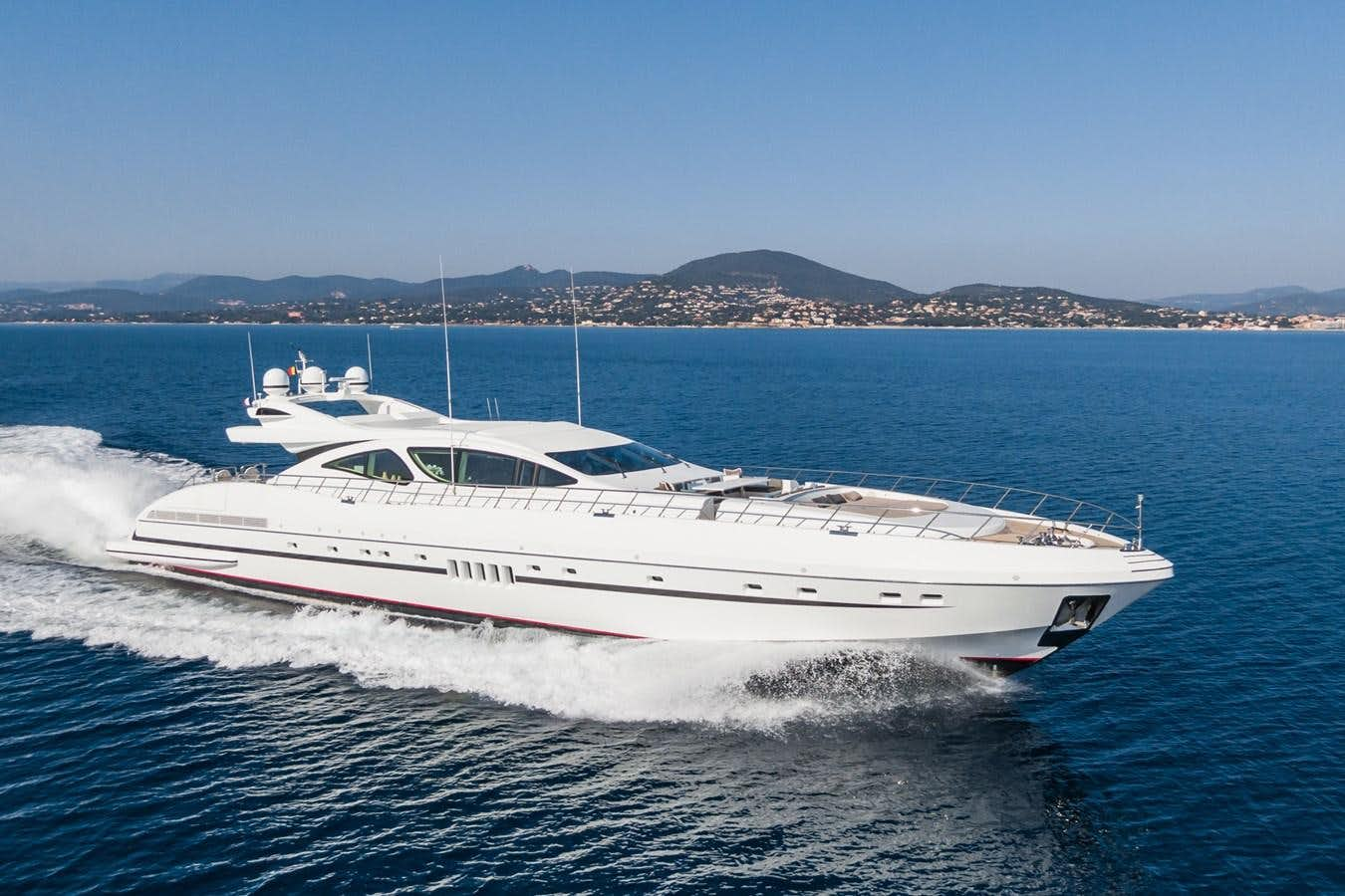 a white yacht on the water aboard MANGUSTA 130 Yacht for Sale