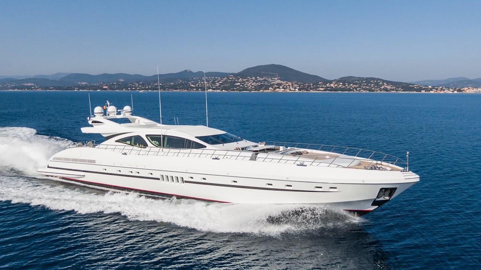 a white yacht on the water aboard MANGUSTA 130 Yacht for Sale
