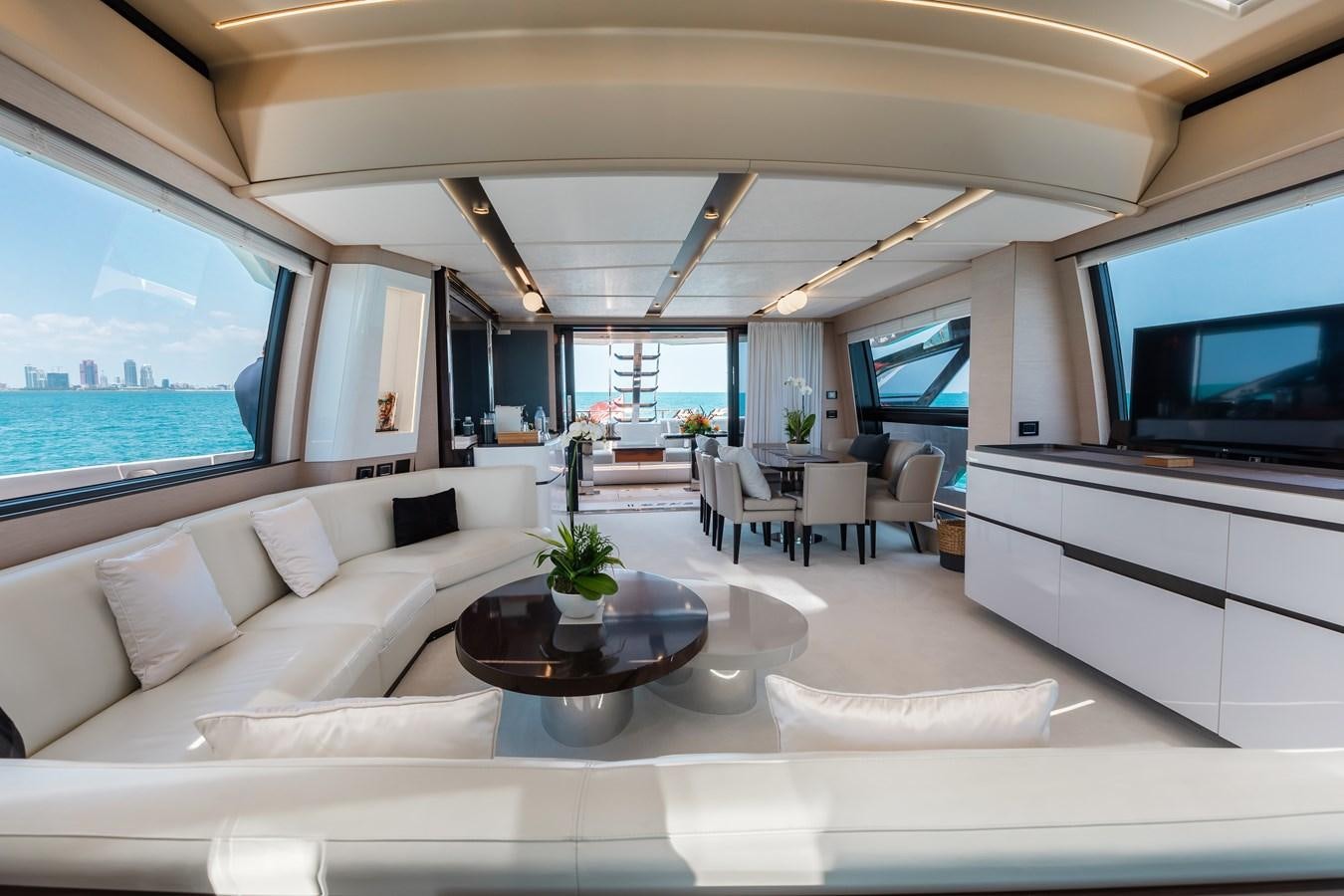 a living room with a large window aboard BASH II Yacht for Sale