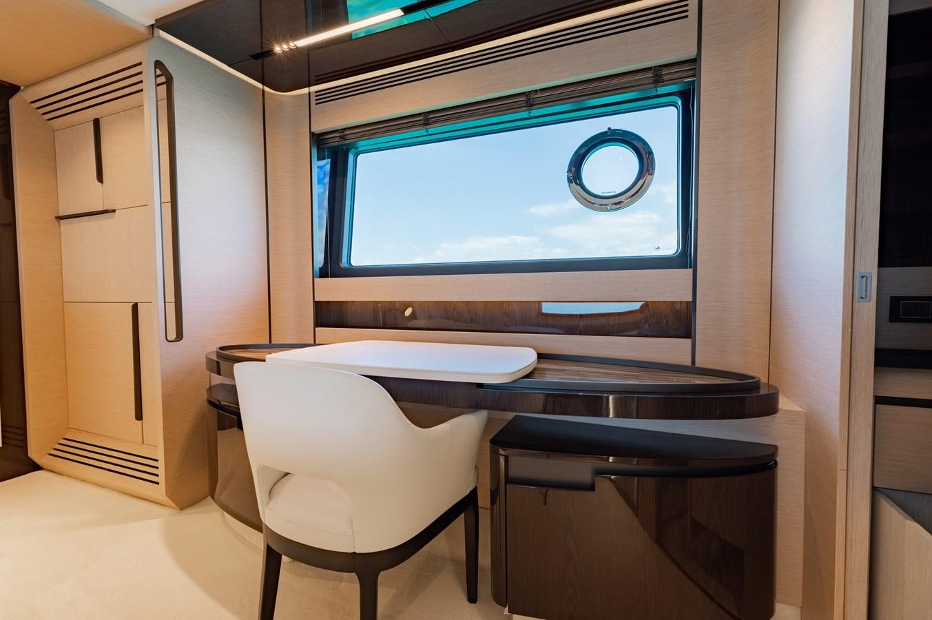 a room with a desk and a tv aboard BASH II Yacht for Sale