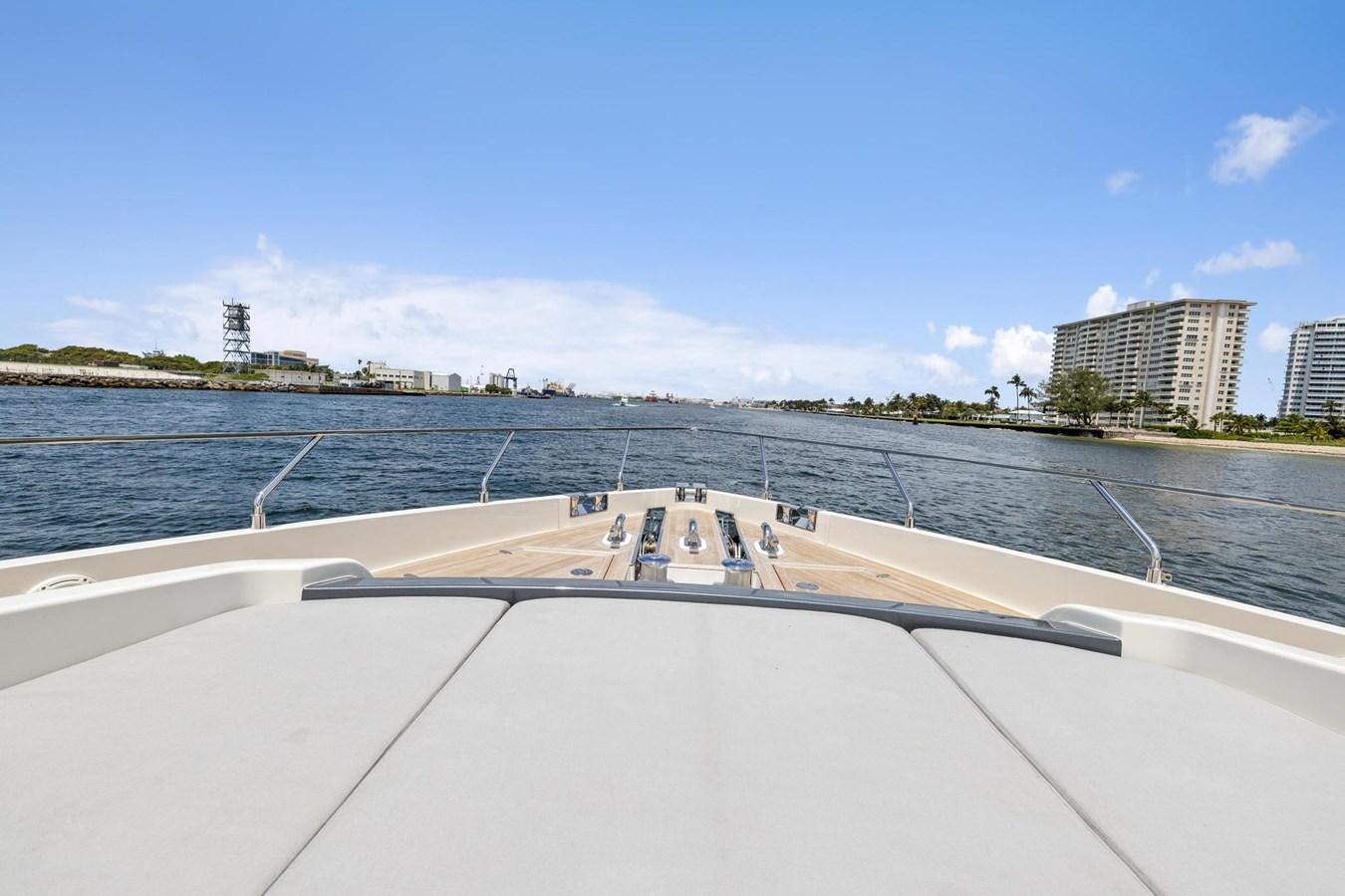 a large white boat on a body of water aboard XFAF8532J021 Yacht for Sale