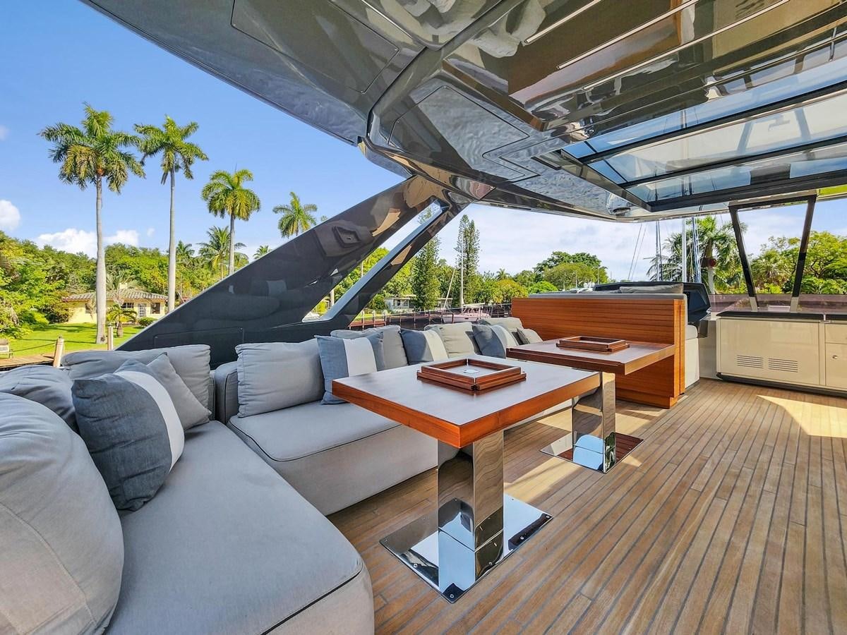 a large lounge area with a couch and a table aboard XFAF8532J021 Yacht for Sale