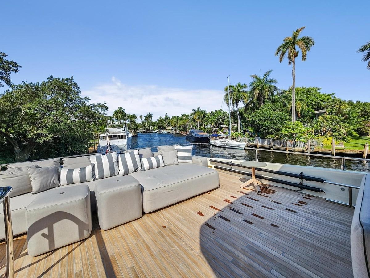 a deck with chairs and a pool aboard XFAF8532J021 Yacht for Sale