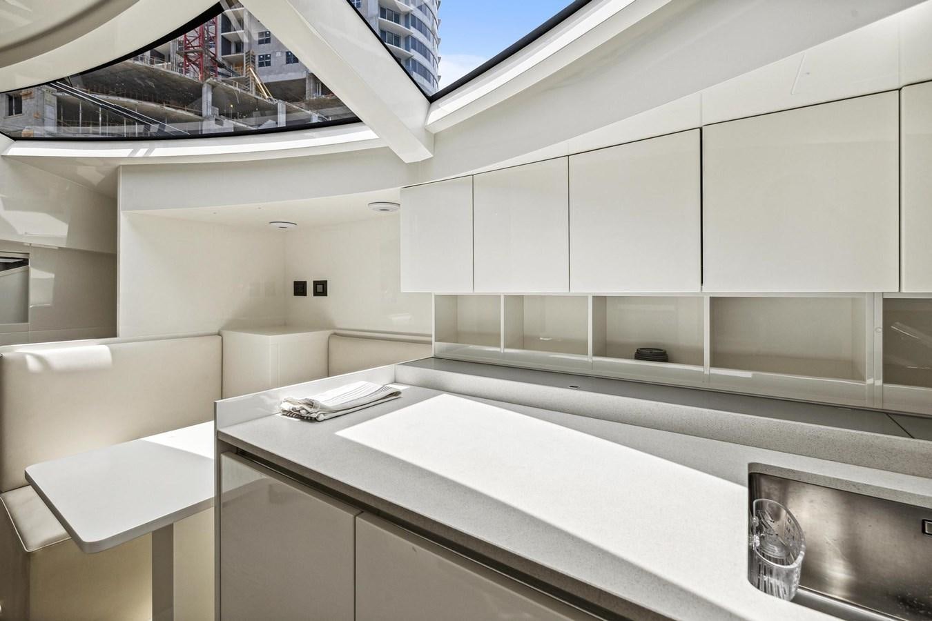 a room with a counter and a window aboard XFAF8532J021 Yacht for Sale