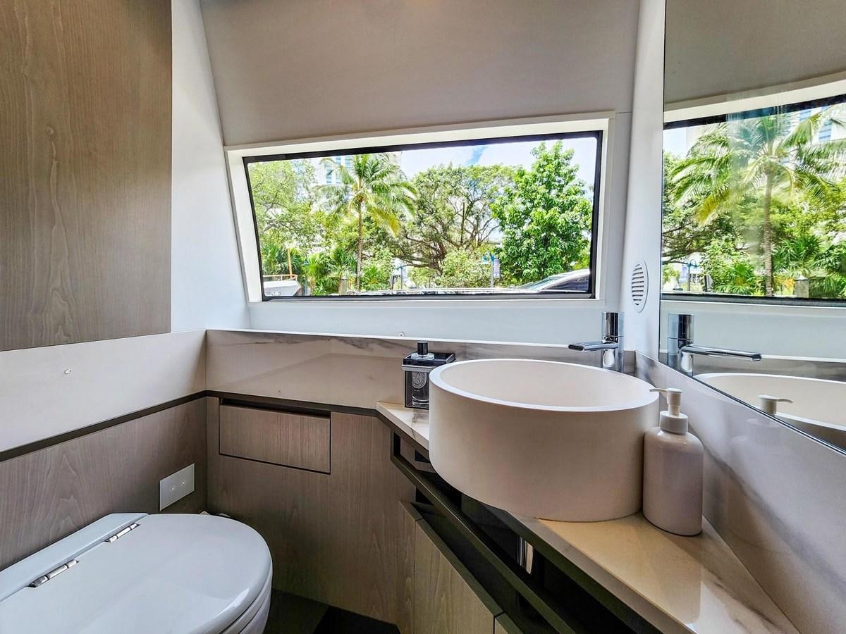 a bathroom with a large window aboard XFAF8532J021 Yacht for Sale