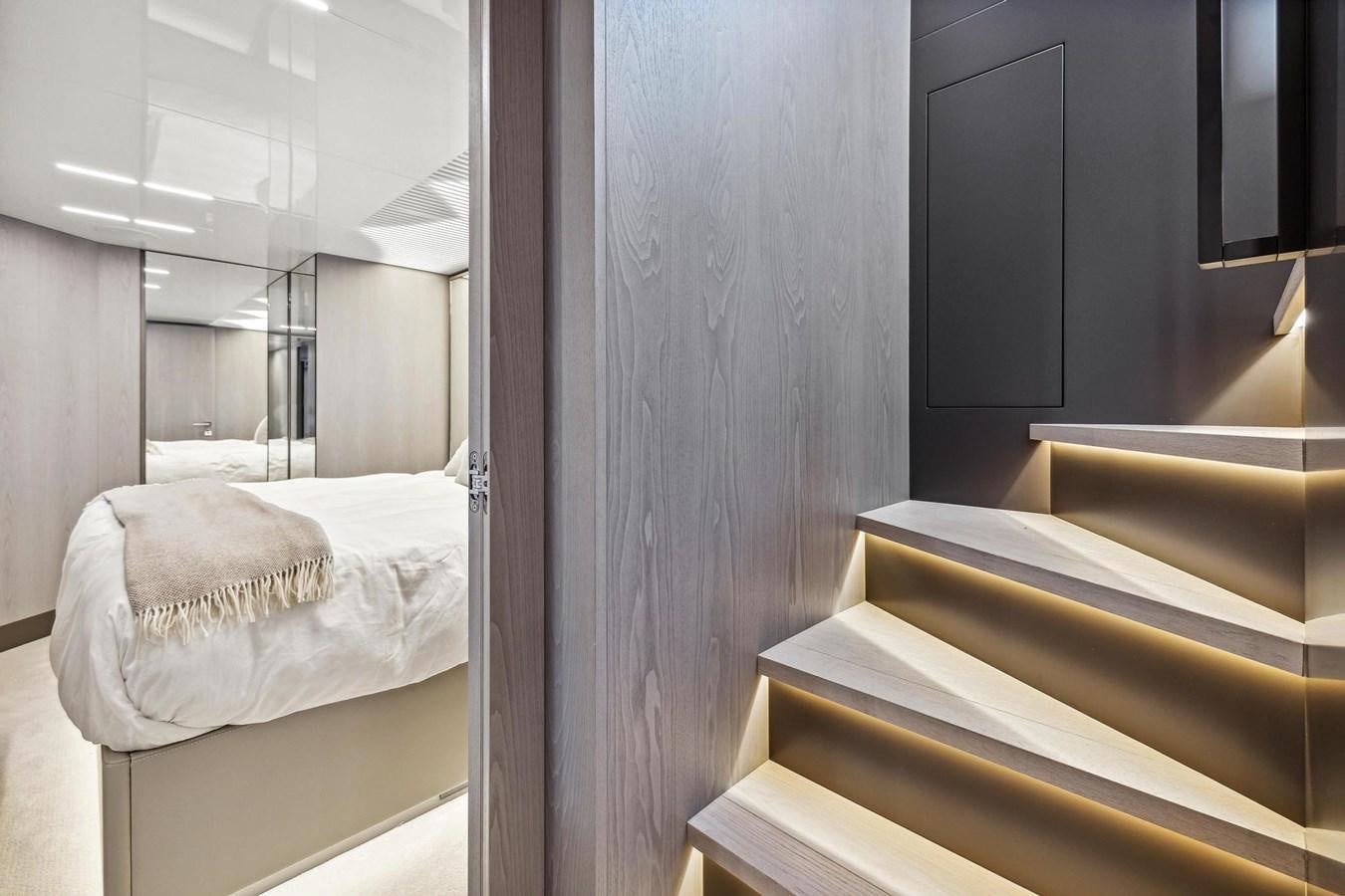 a room with a bed and a desk aboard XFAF8532J021 Yacht for Sale