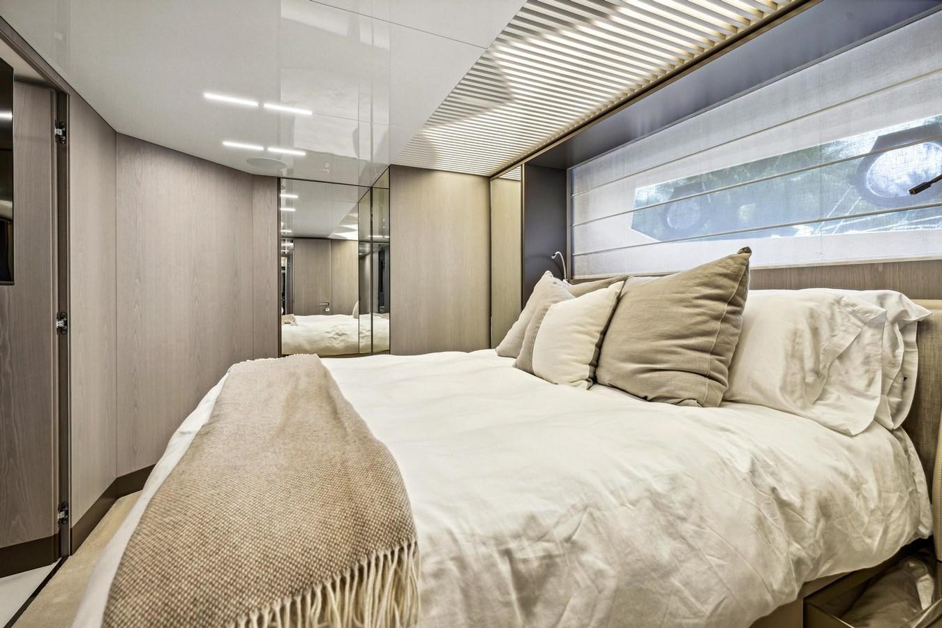 a room with a bed and a window aboard XFAF8532J021 Yacht for Sale