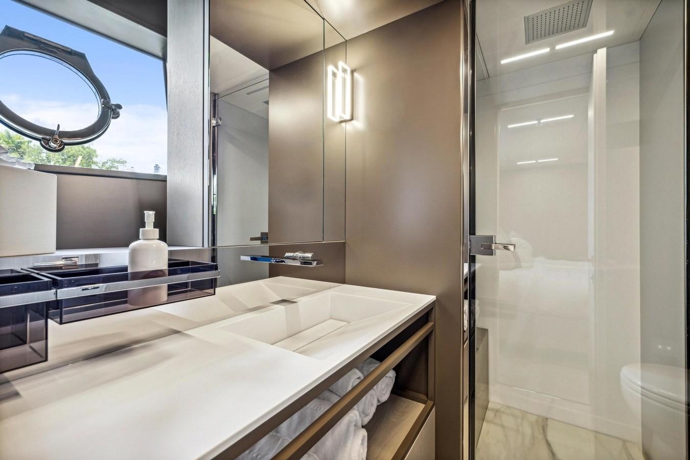 a bathroom with a large window aboard XFAF8532J021 Yacht for Sale
