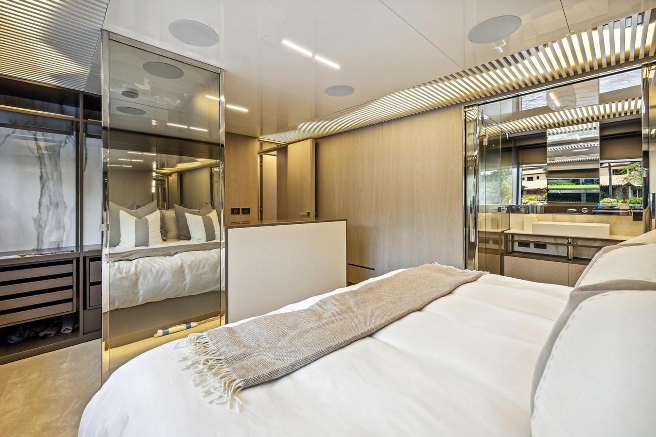 a room with a bed and a mirror aboard XFAF8532J021 Yacht for Sale