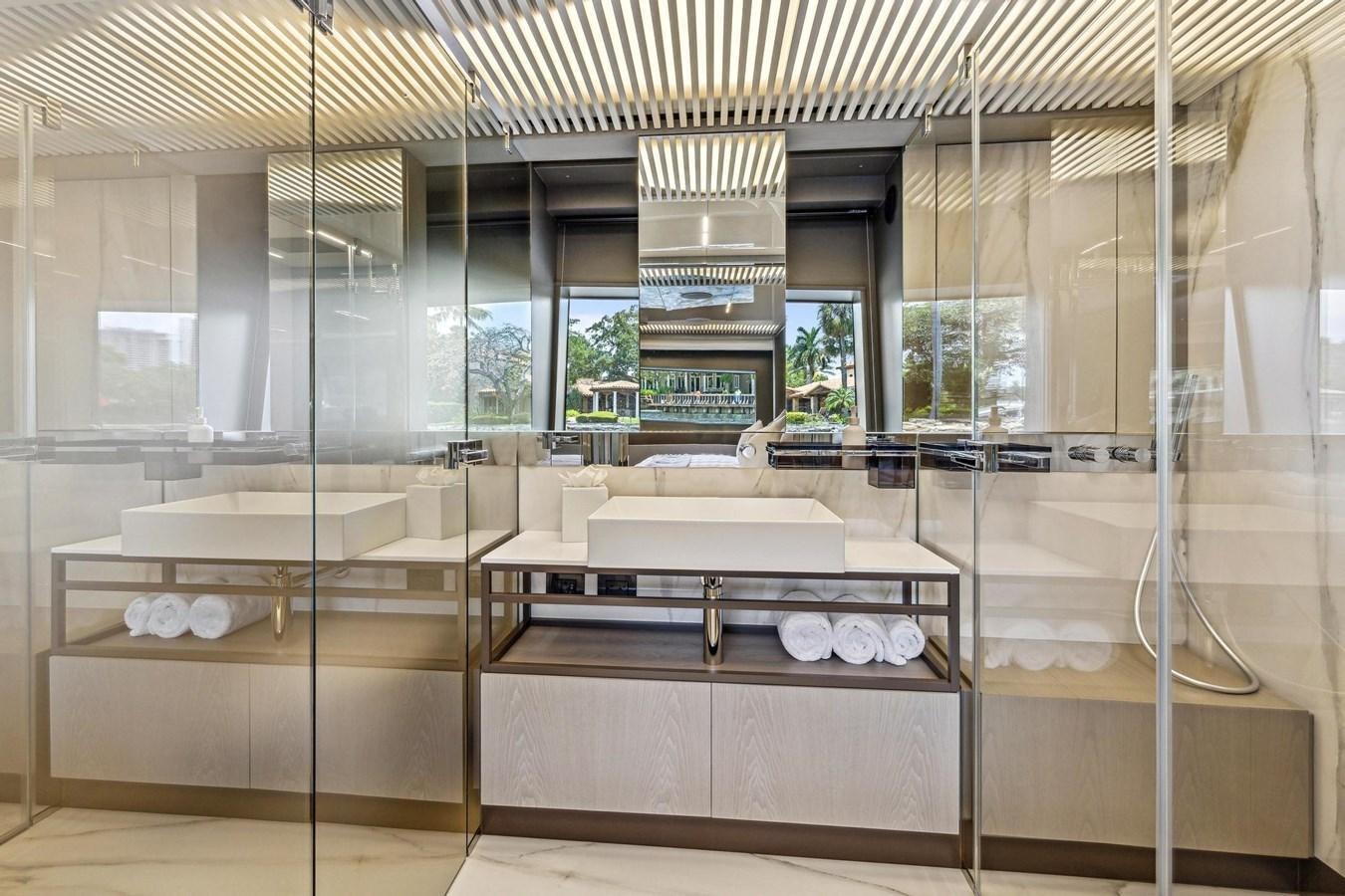 a large bathroom with glass walls aboard XFAF8532J021 Yacht for Sale