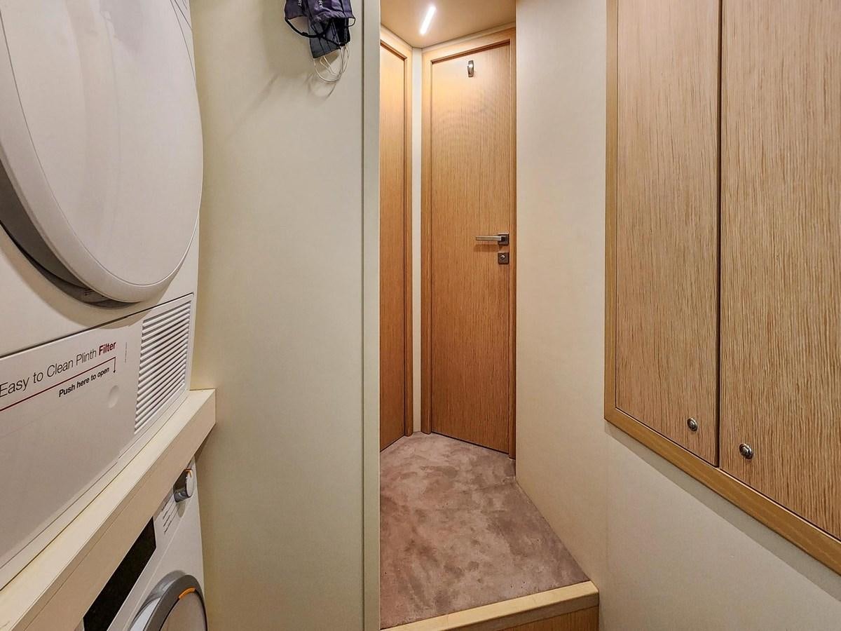 a small bathroom with a closet aboard XFAF8532J021 Yacht for Sale
