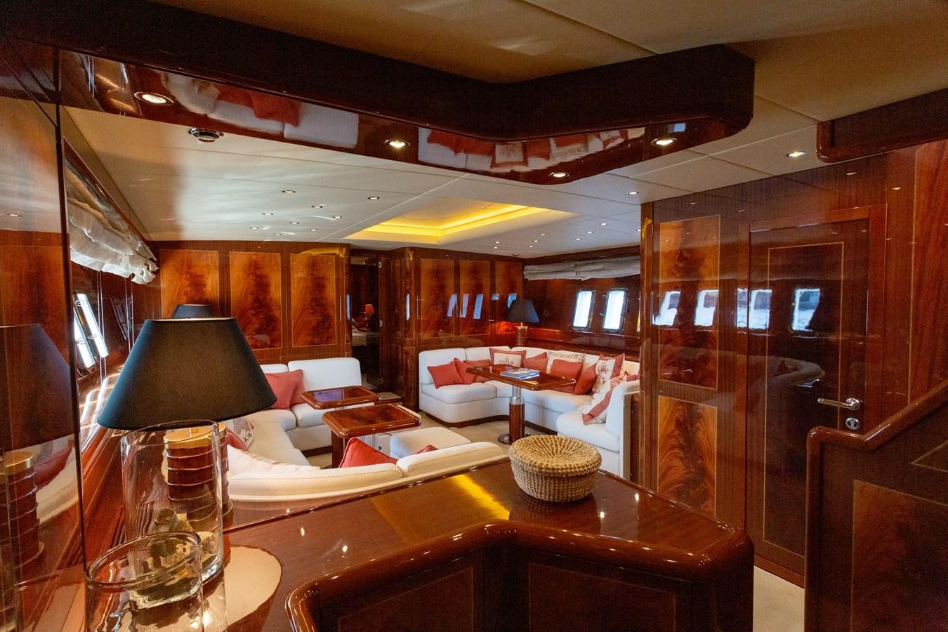 a room with a table and chairs aboard STAND BY ME Yacht for Sale