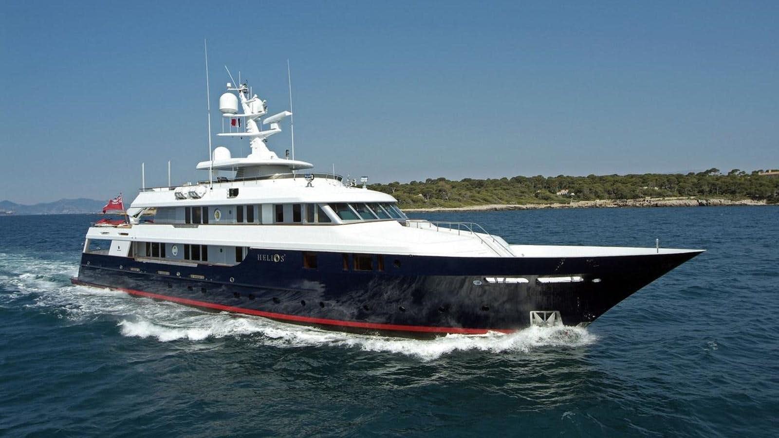 a large boat on the water aboard HELIOS 2 Yacht for Sale
