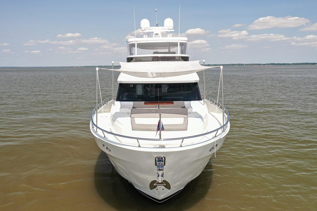 a white boat in the water aboard 70E Yacht for Sale
