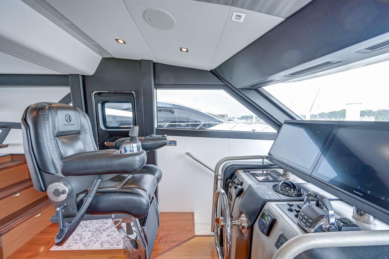 inside of a vehicle with a large screen and a large window aboard 70E Yacht for Sale