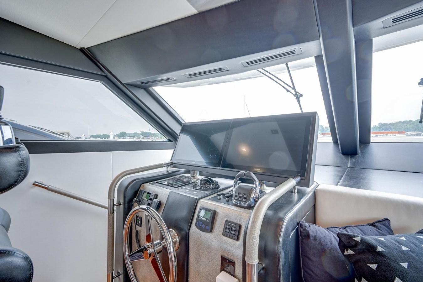 the inside of a vehicle aboard 70E Yacht for Sale