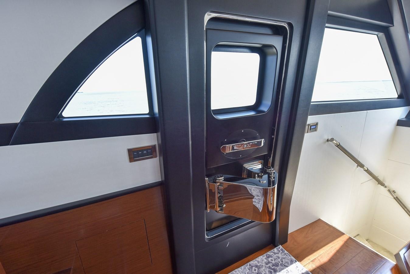 a door open to a room aboard 70E Yacht for Sale
