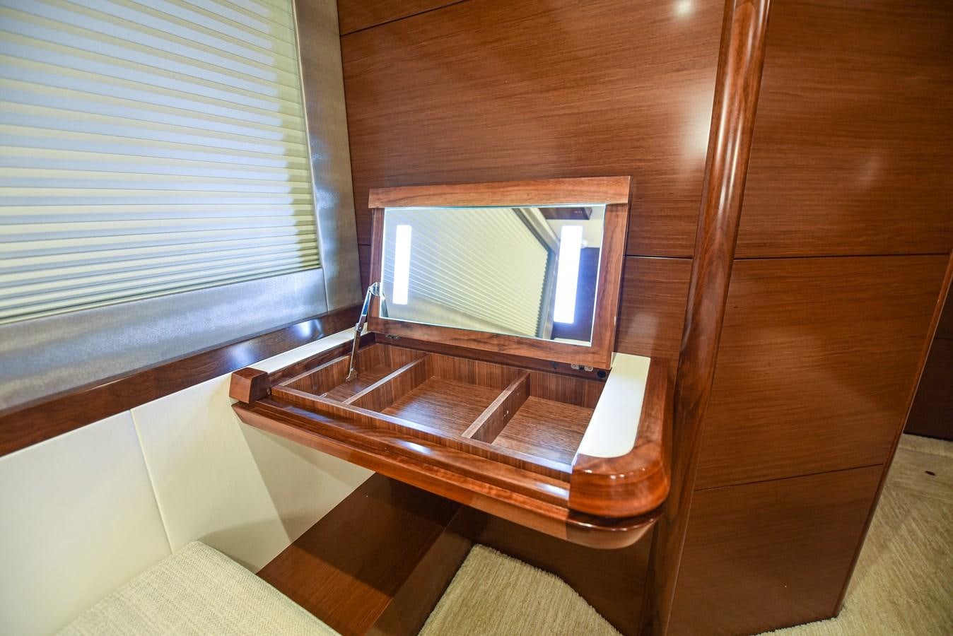 a wooden bathroom with a sink aboard 70E Yacht for Sale