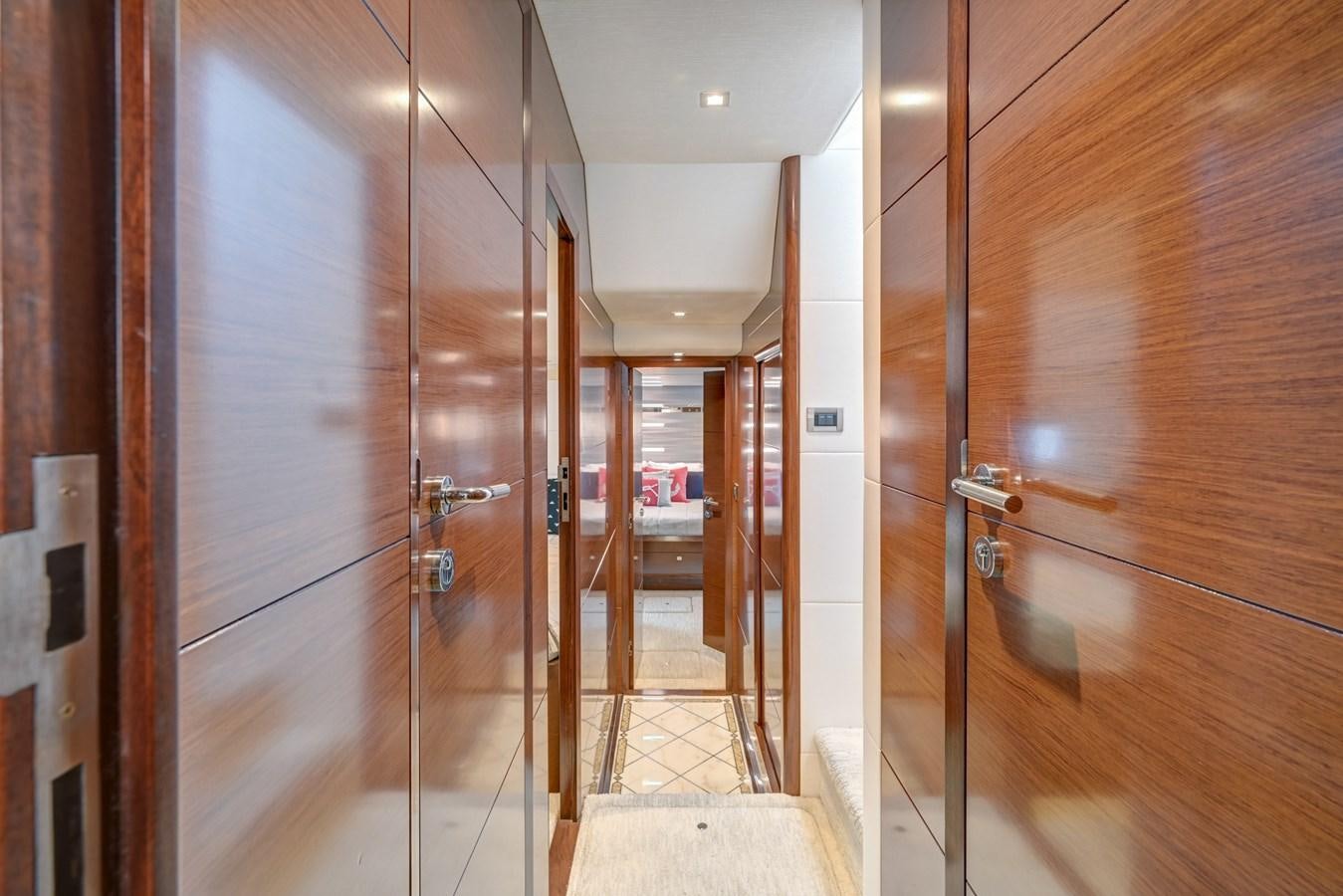 a room with a glass door aboard 70E Yacht for Sale