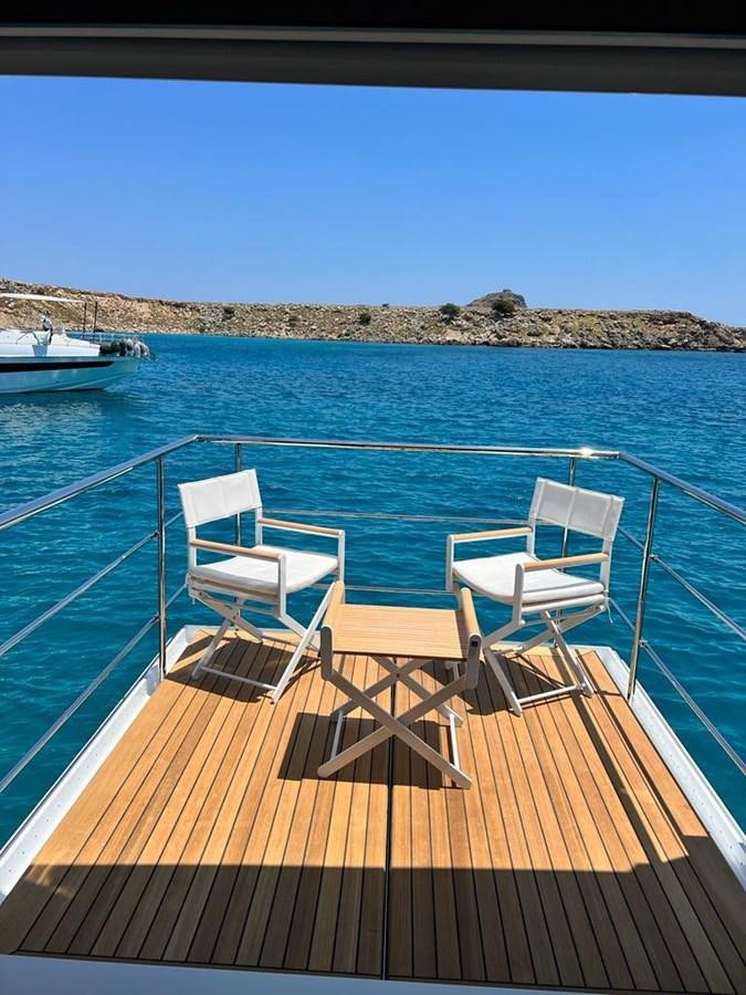 a deck overlooking the ocean aboard LOVE T Yacht for Sale