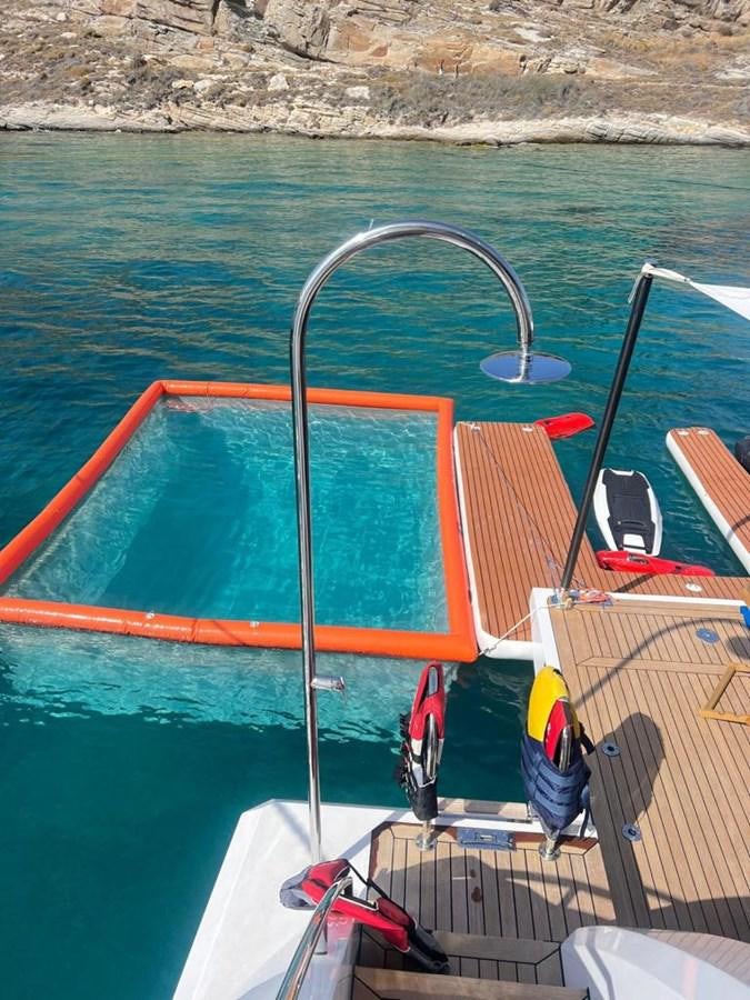 a boat with a paddle aboard LOVE T Yacht for Sale