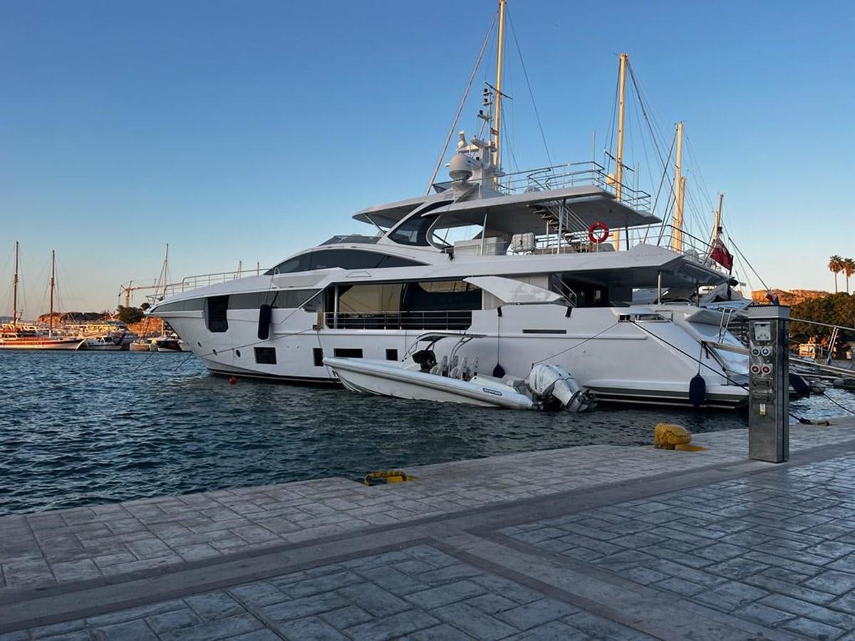 a boat docked at a dock aboard LOVE T Yacht for Sale