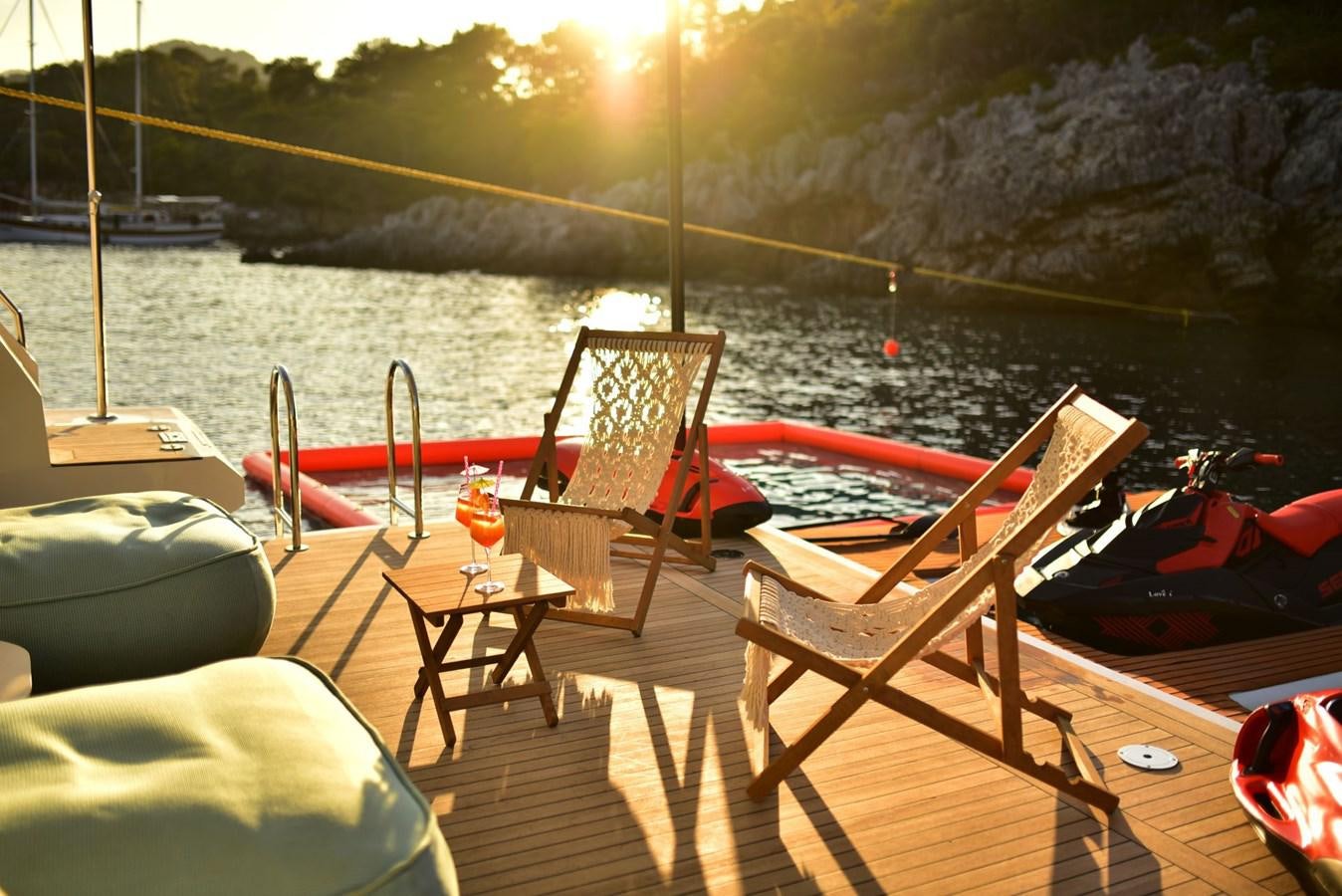 a boat on a dock aboard LOVE T Yacht for Sale