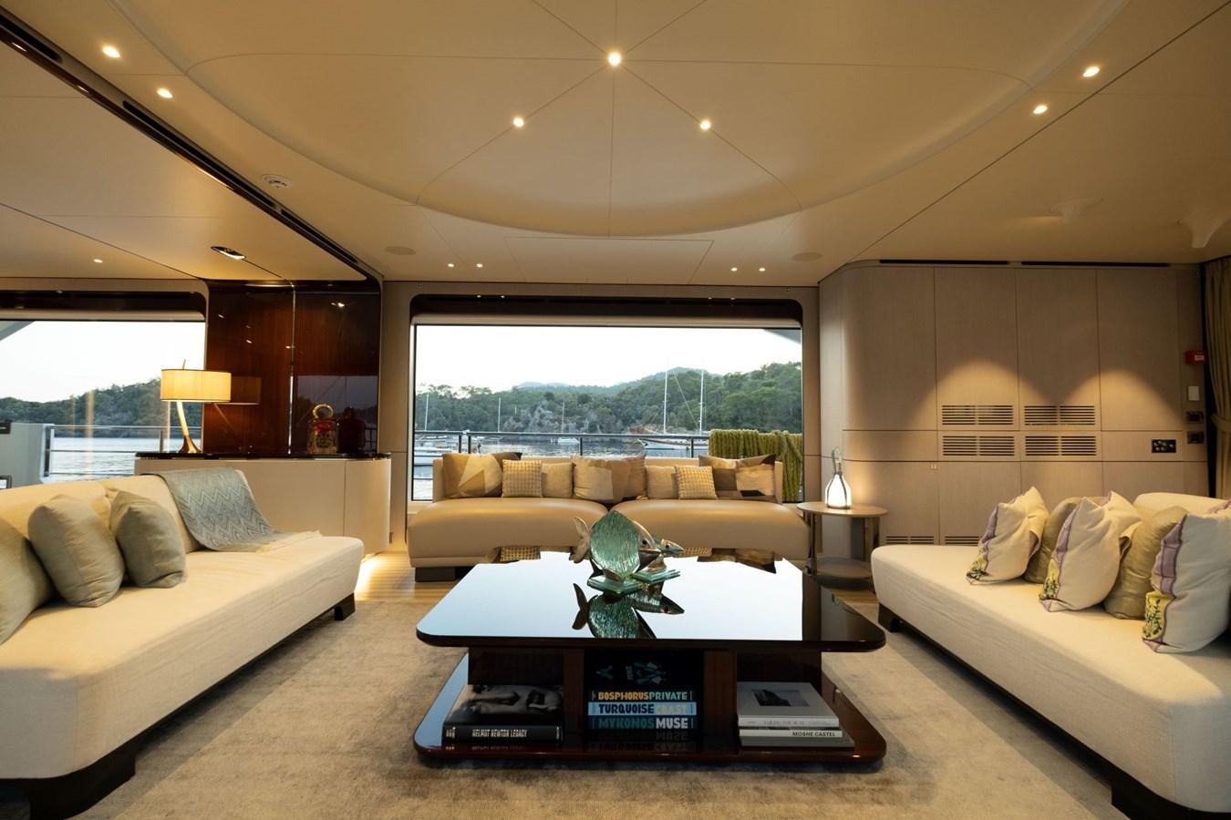a living room with a couch and a coffee table aboard LOVE T Yacht for Sale