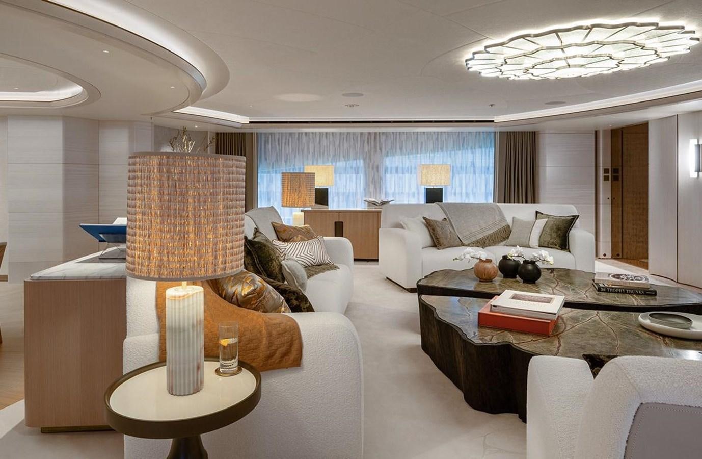 a living room with a large window aboard SPARTA Yacht for Sale