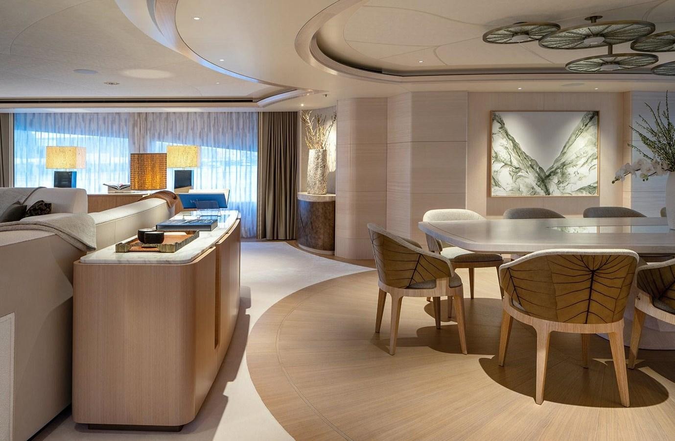 a living room with a couch and a table aboard SPARTA Yacht for Sale