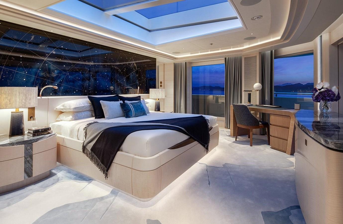 a large bedroom with a large bed aboard SPARTA Yacht for Sale