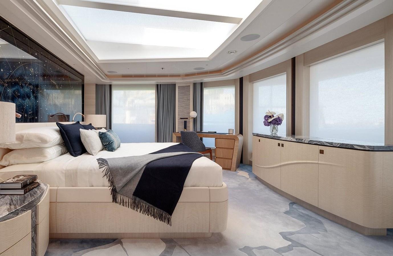 a bedroom with a large bed aboard SPARTA Yacht for Sale