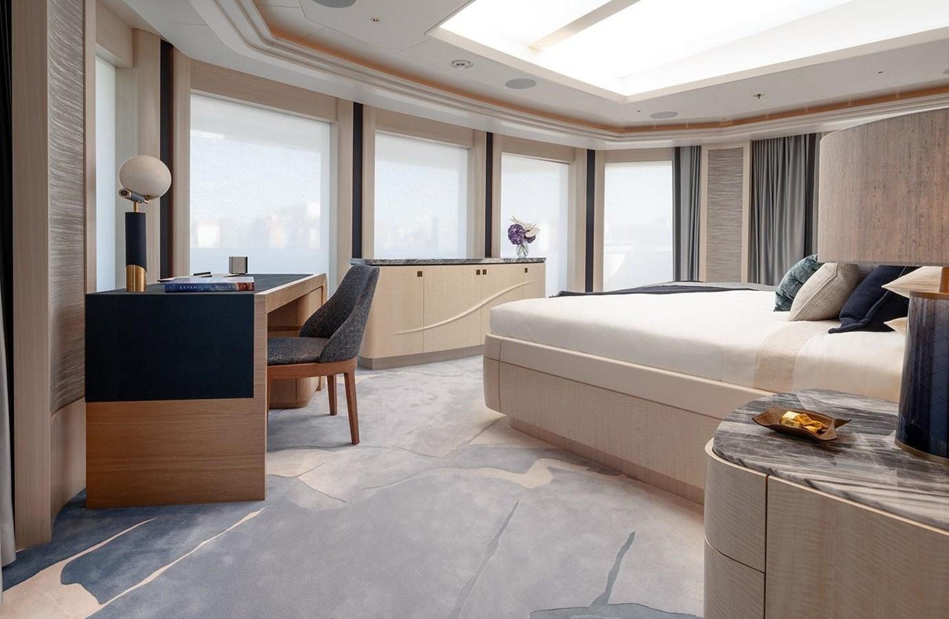 a living room with a couch and a table aboard SPARTA Yacht for Sale