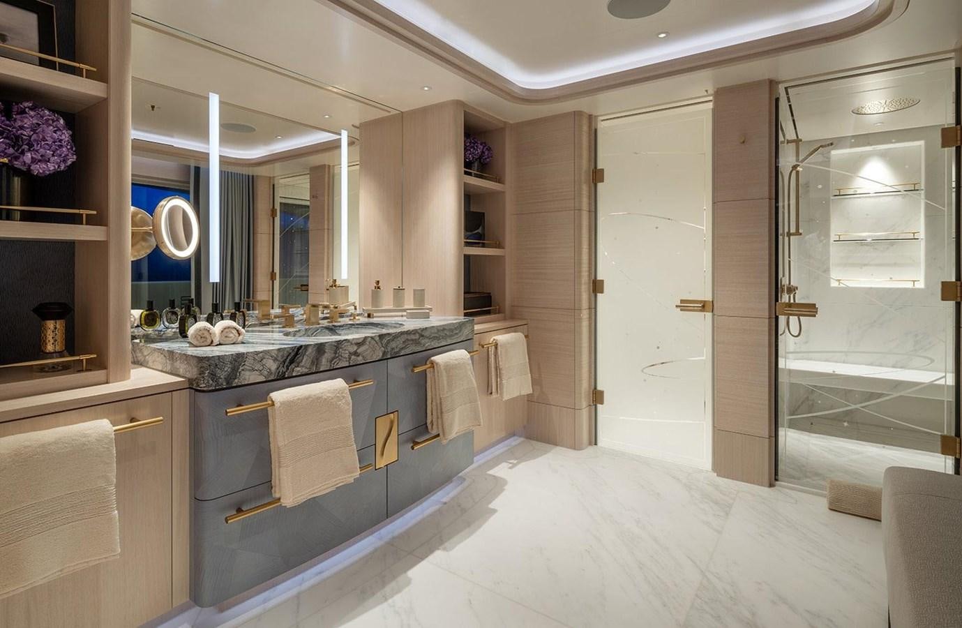 a bathroom with a large mirror aboard SPARTA Yacht for Sale