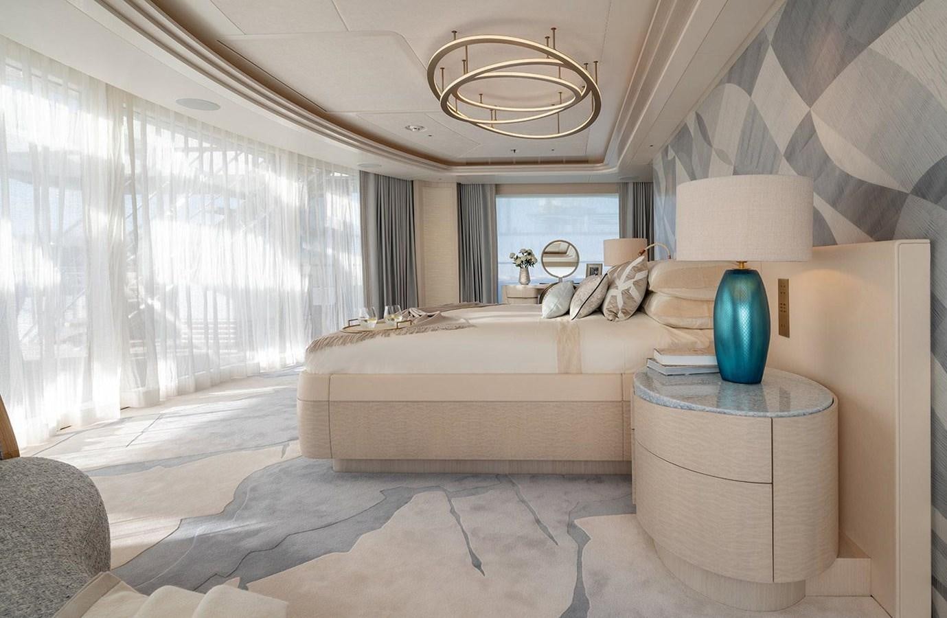 a large bedroom with a large bed aboard SPARTA Yacht for Sale