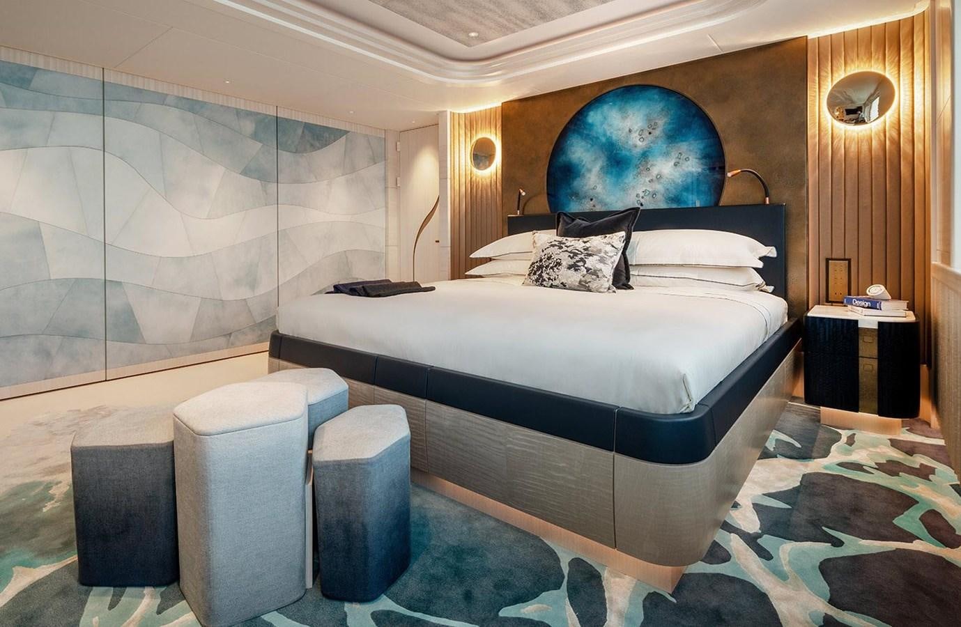 a bed with a white bed aboard SPARTA Yacht for Sale