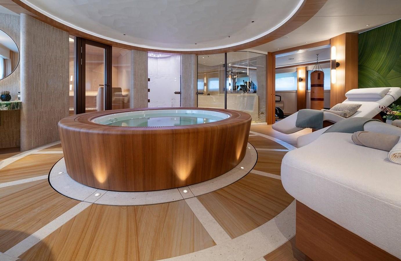 a large bathroom with a large jacuzzi aboard SPARTA Yacht for Sale