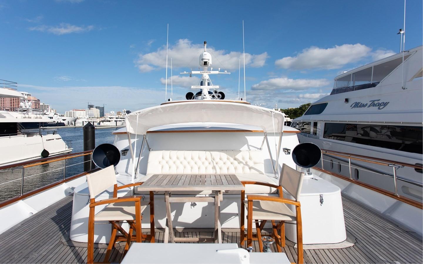 a boat docked at a pier aboard SOVEREIGN Yacht for Sale
