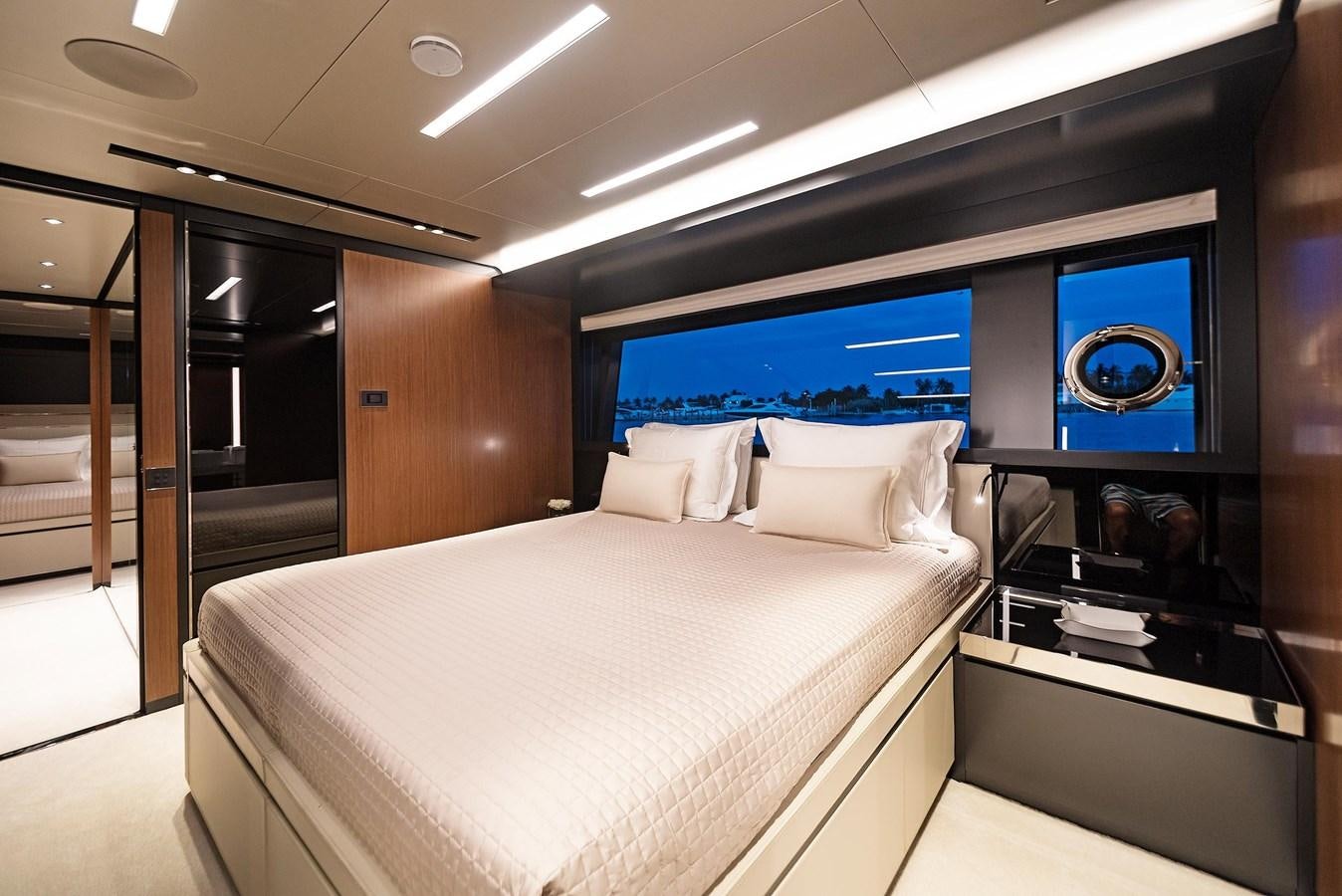 a bed in a room aboard ALLEGRA  @ AVENTURA Yacht for Sale