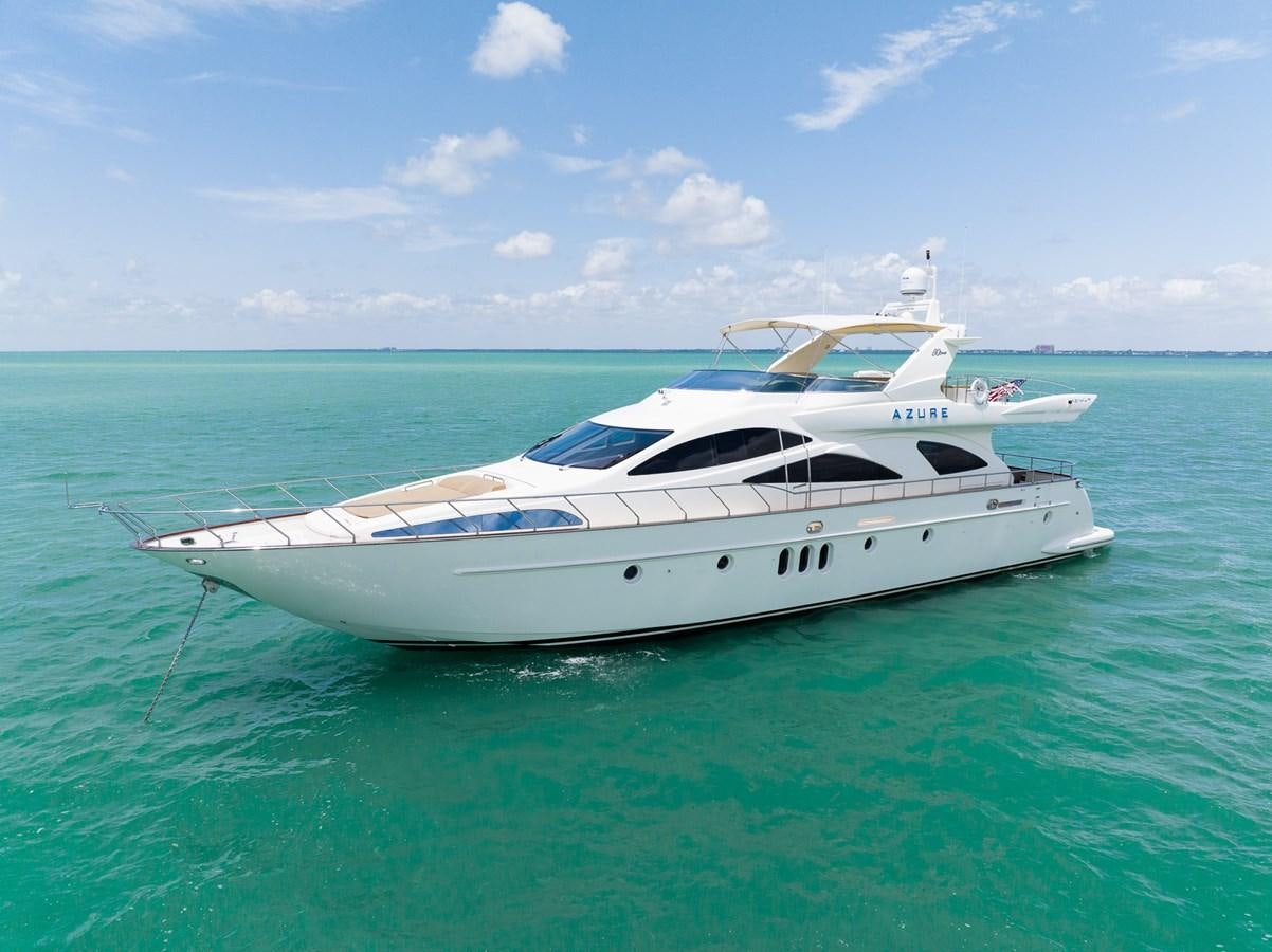 a white yacht in the water aboard 80 CARAT Yacht for Sale