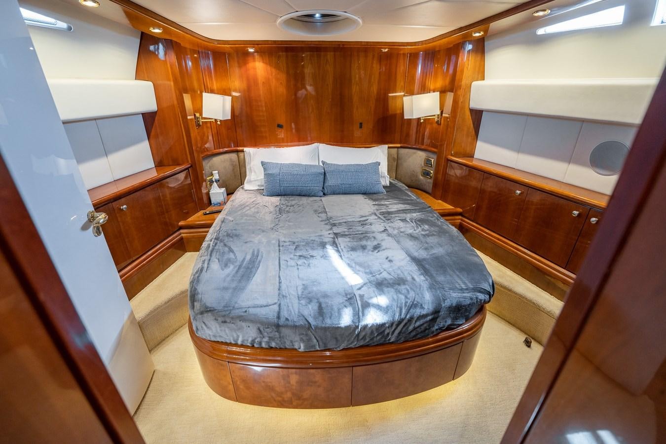 a bed in a room aboard 80 CARAT Yacht for Sale