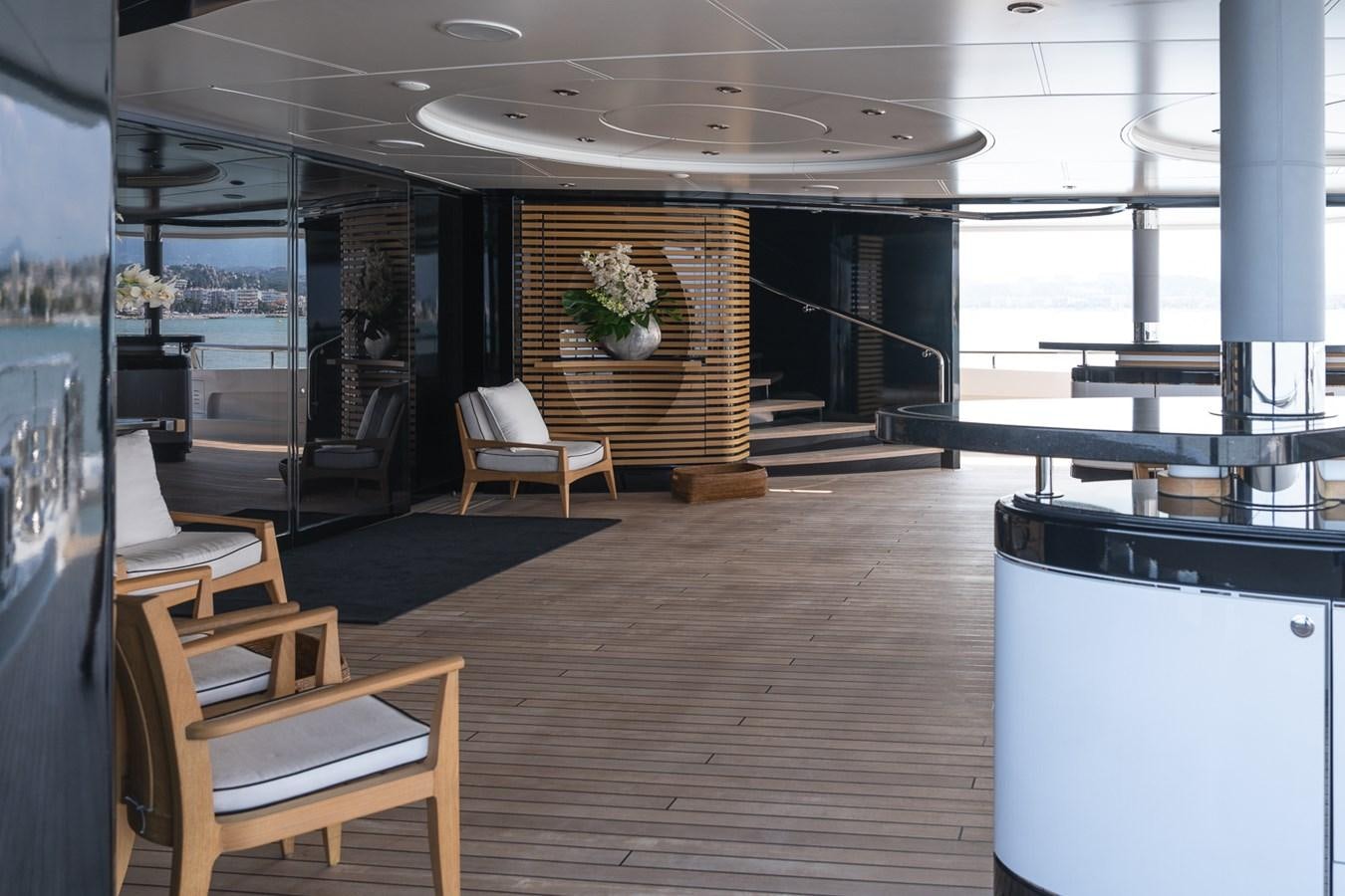 a room with a wood floor and a staircase aboard WHISPER Yacht for Sale