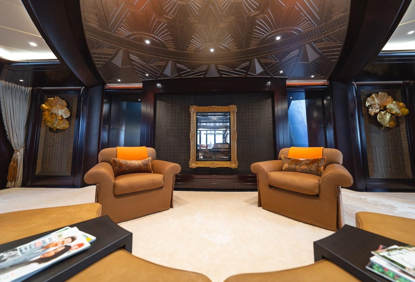 a room with a couch and a fireplace aboard WHISPER Yacht for Sale