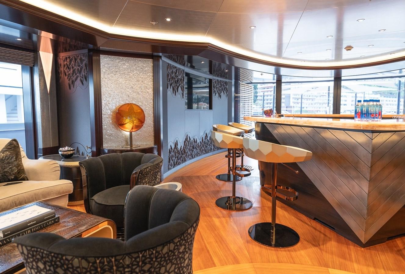 a room with a piano and a chair and a piano aboard WHISPER Yacht for Sale