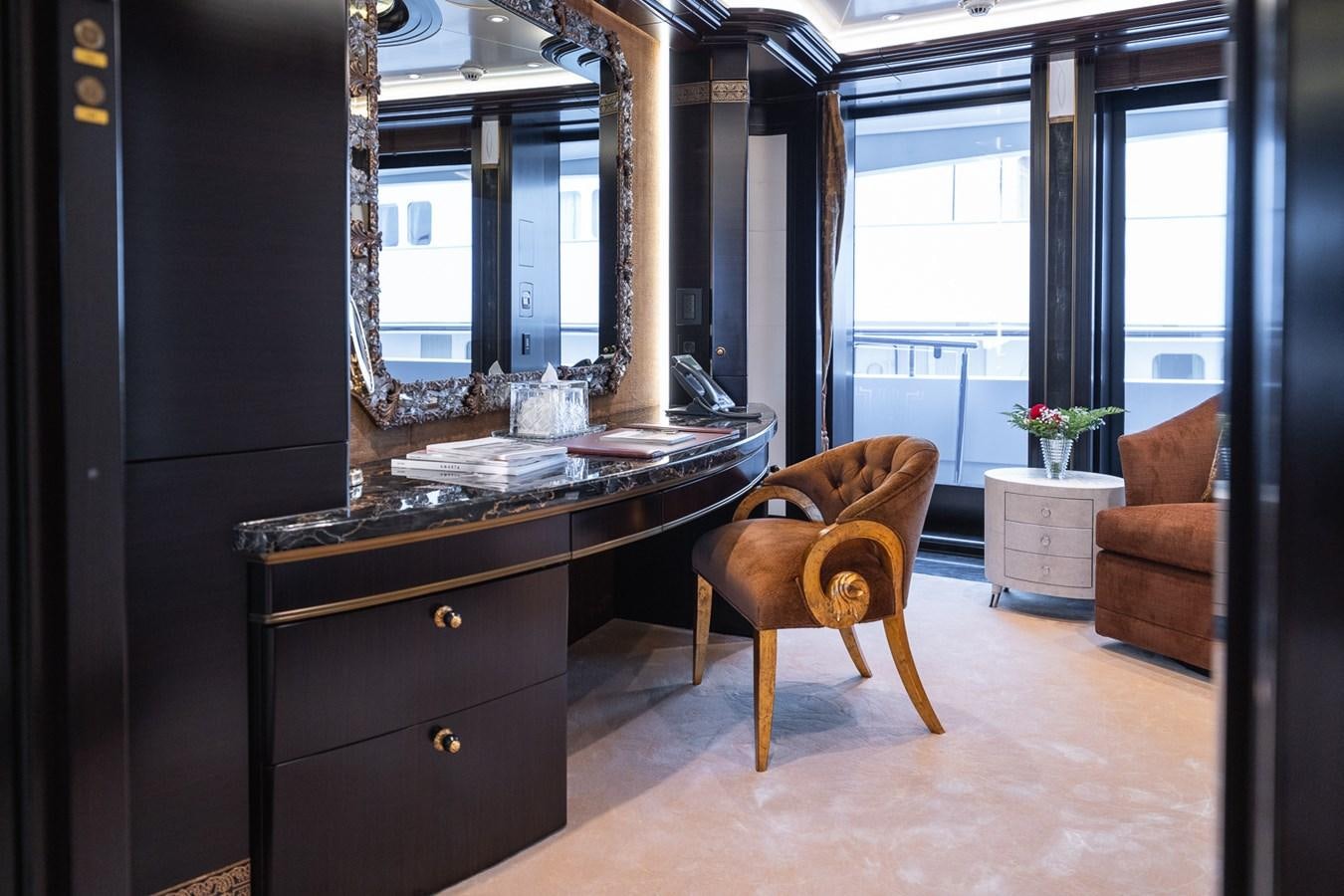 a living room with a large mirror aboard WHISPER Yacht for Sale