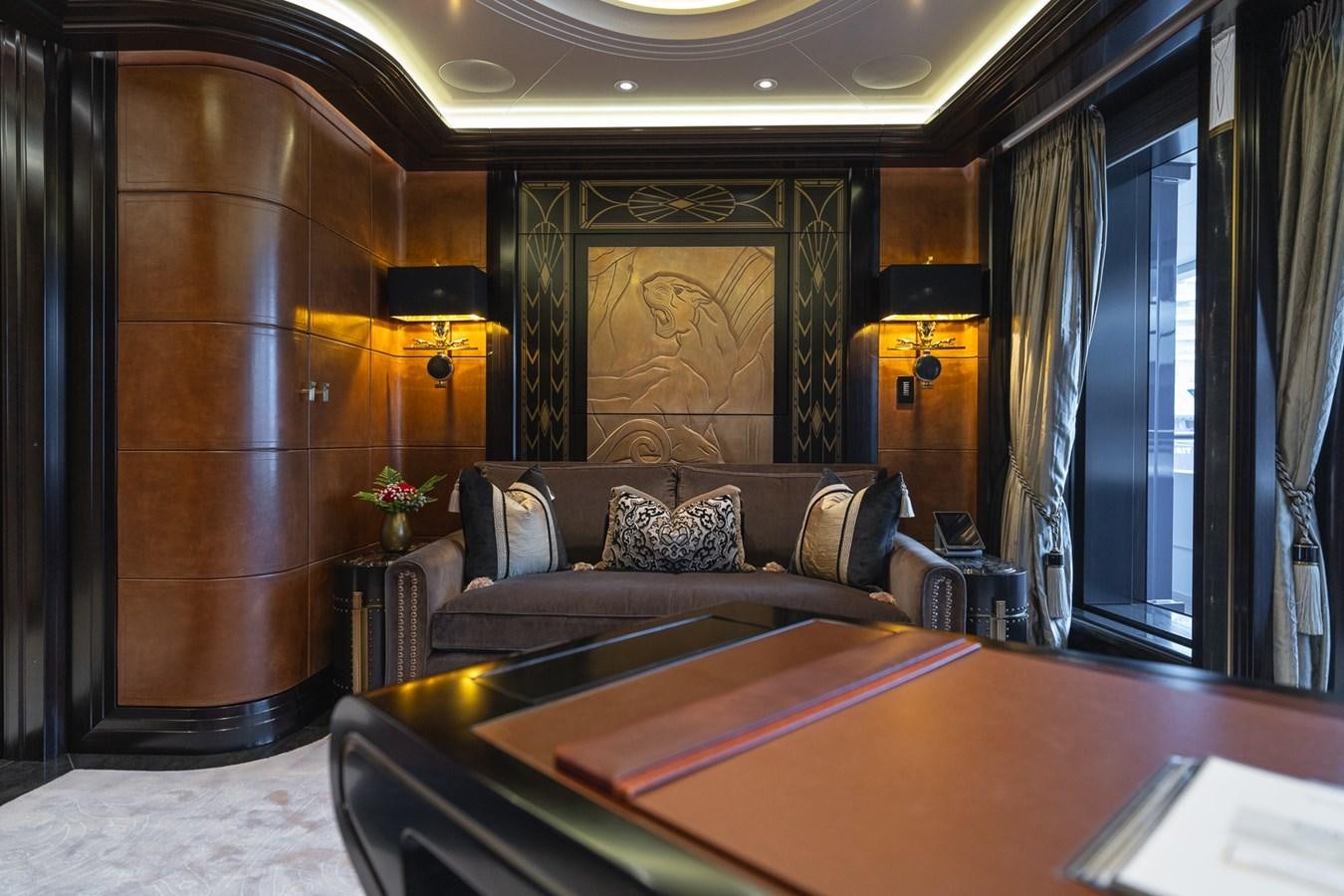 a living room with a couch and a table aboard WHISPER Yacht for Sale