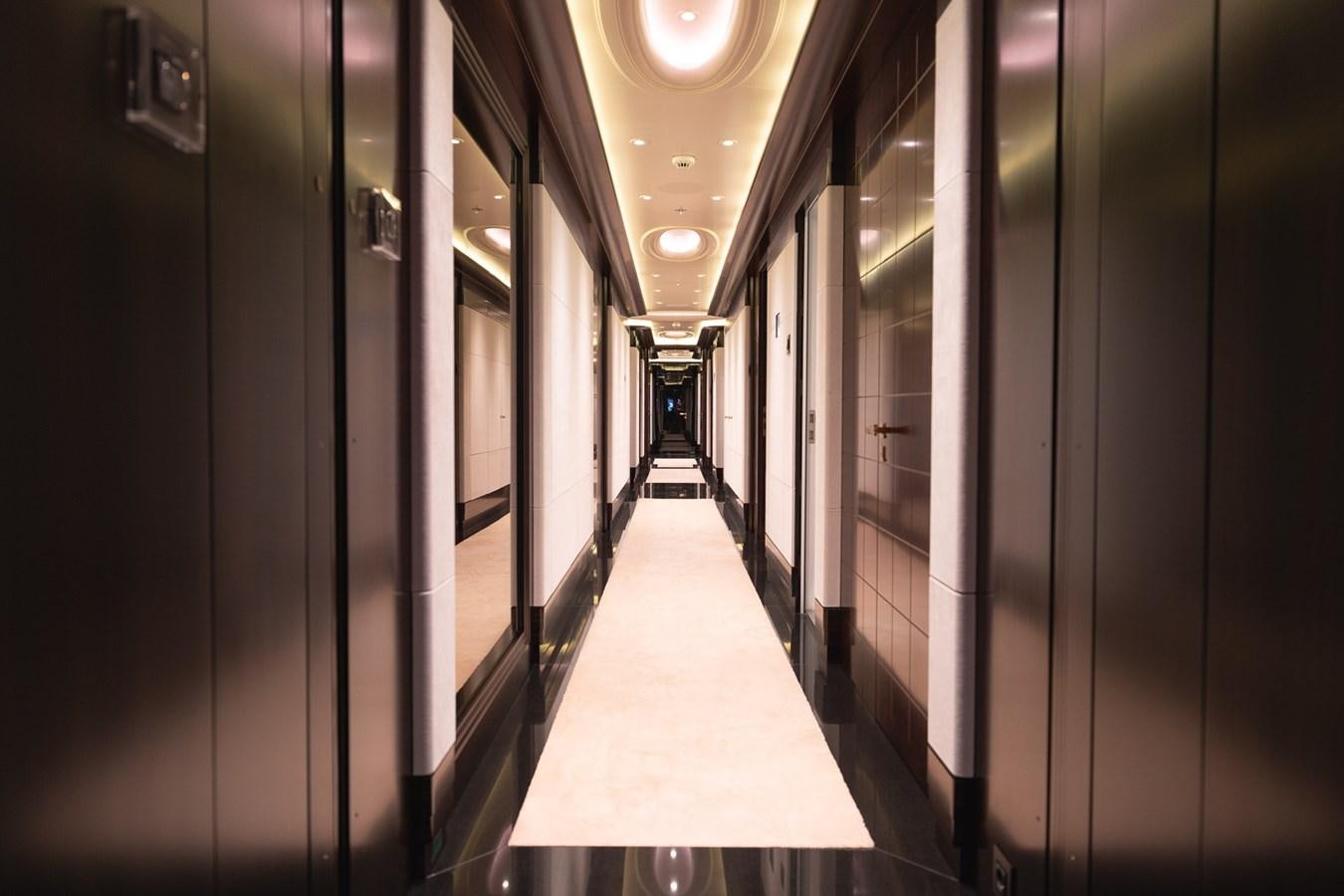 a hallway with doors aboard WHISPER Yacht for Sale